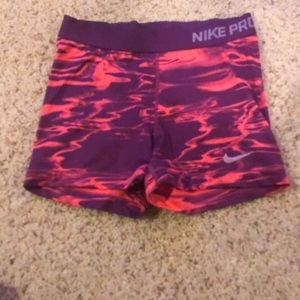 Purple and orange Nike spandex